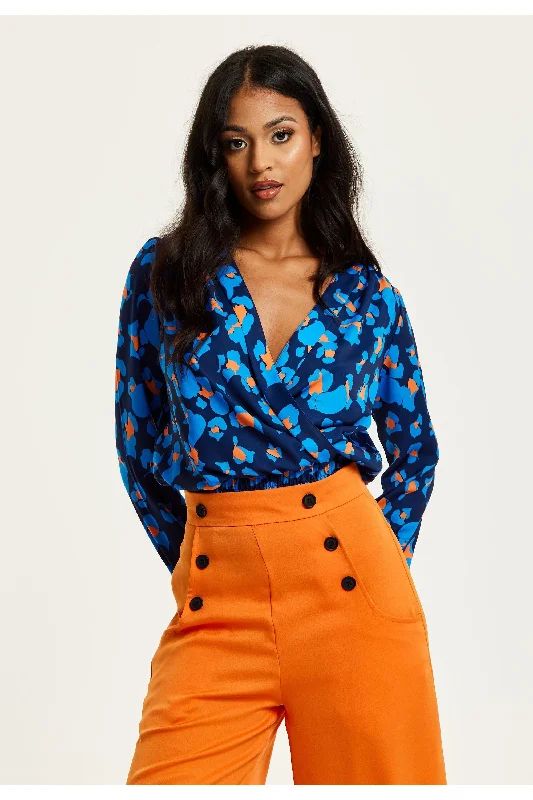 Liquorish Abstract Print Wrap Top In Pink Orange And Blue